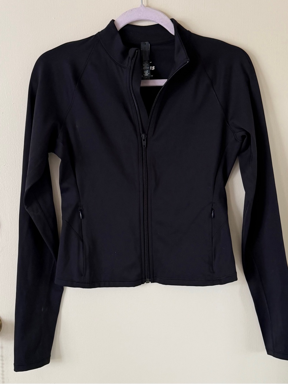Nike x SKIMS Matte Mock Neck Full-Zip Jacket.